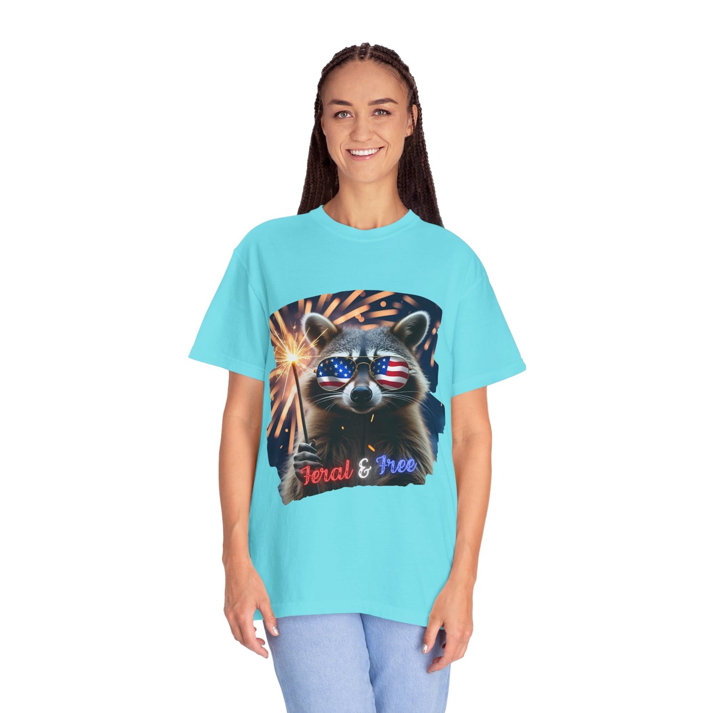 Stay wild in our “Feral & Free” tee! Featuring a raccoon rocking flag aviators, a sparkler in paw, and fireworks bursting behind—it’s pure chaotic patriotic energy for your summer vibe.