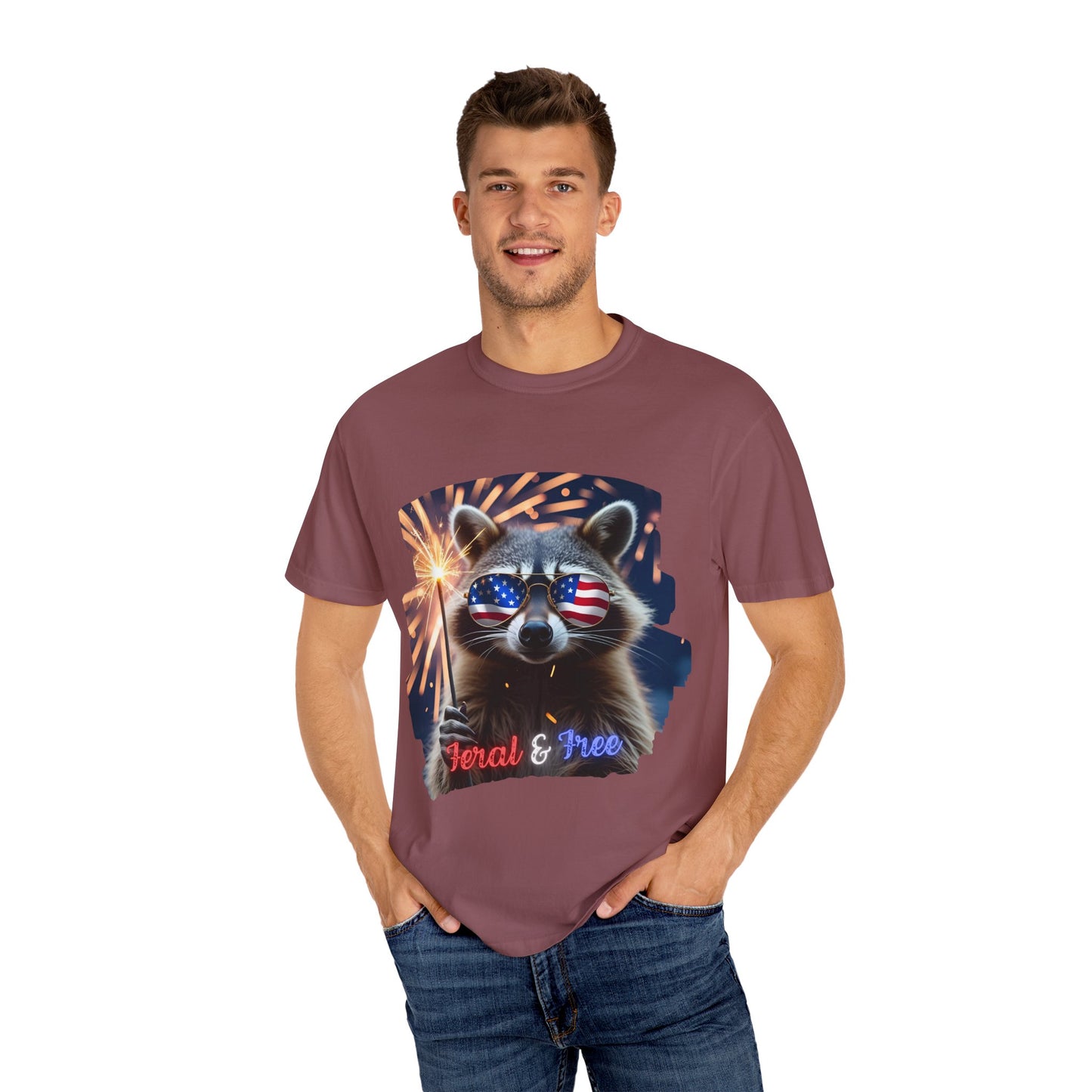Stay wild in our “Feral & Free” tee! Featuring a raccoon rocking flag aviators, a sparkler in paw, and fireworks bursting behind—it’s pure chaotic patriotic energy for your summer vibe.