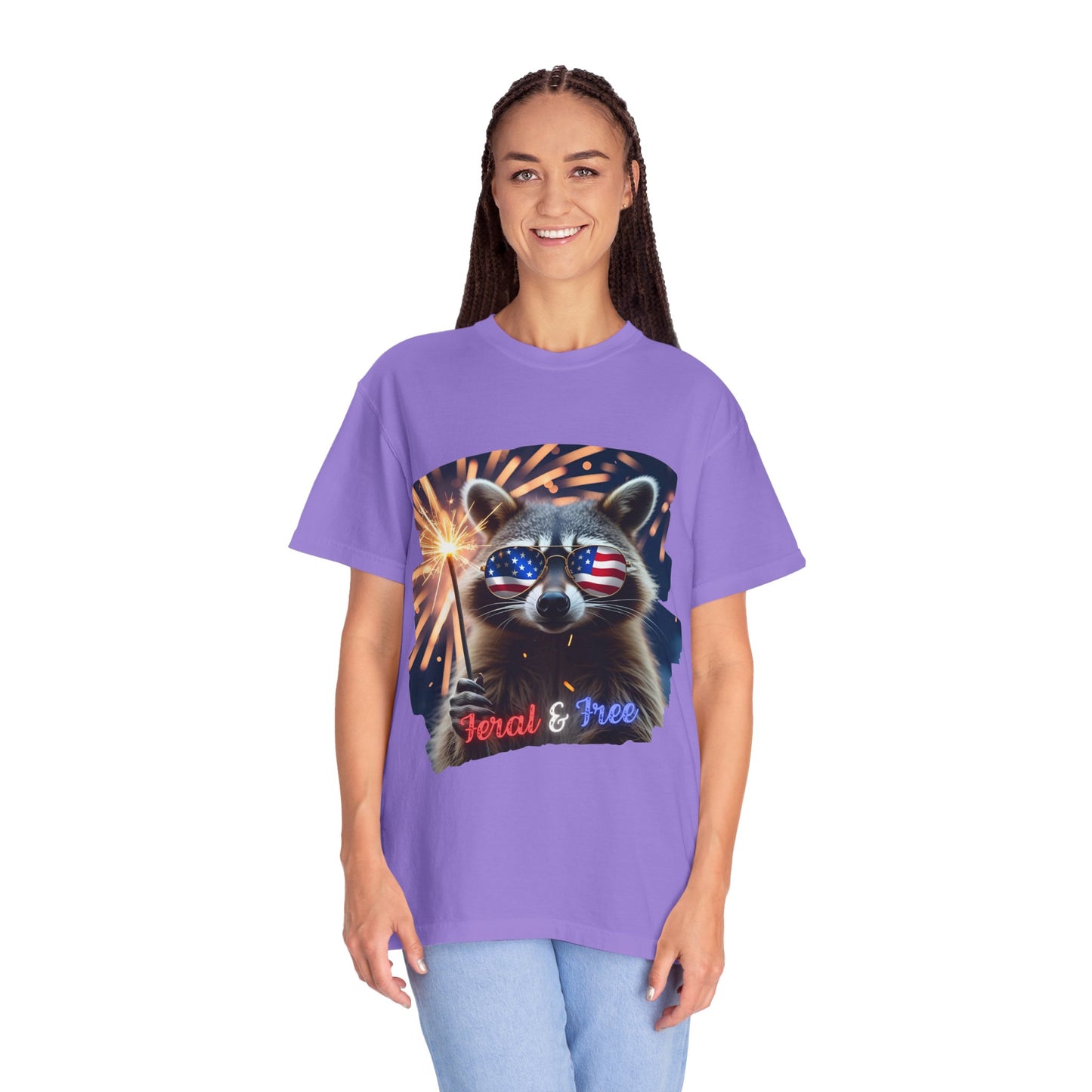 Stay wild in our “Feral & Free” tee! Featuring a raccoon rocking flag aviators, a sparkler in paw, and fireworks bursting behind—it’s pure chaotic patriotic energy for your summer vibe.