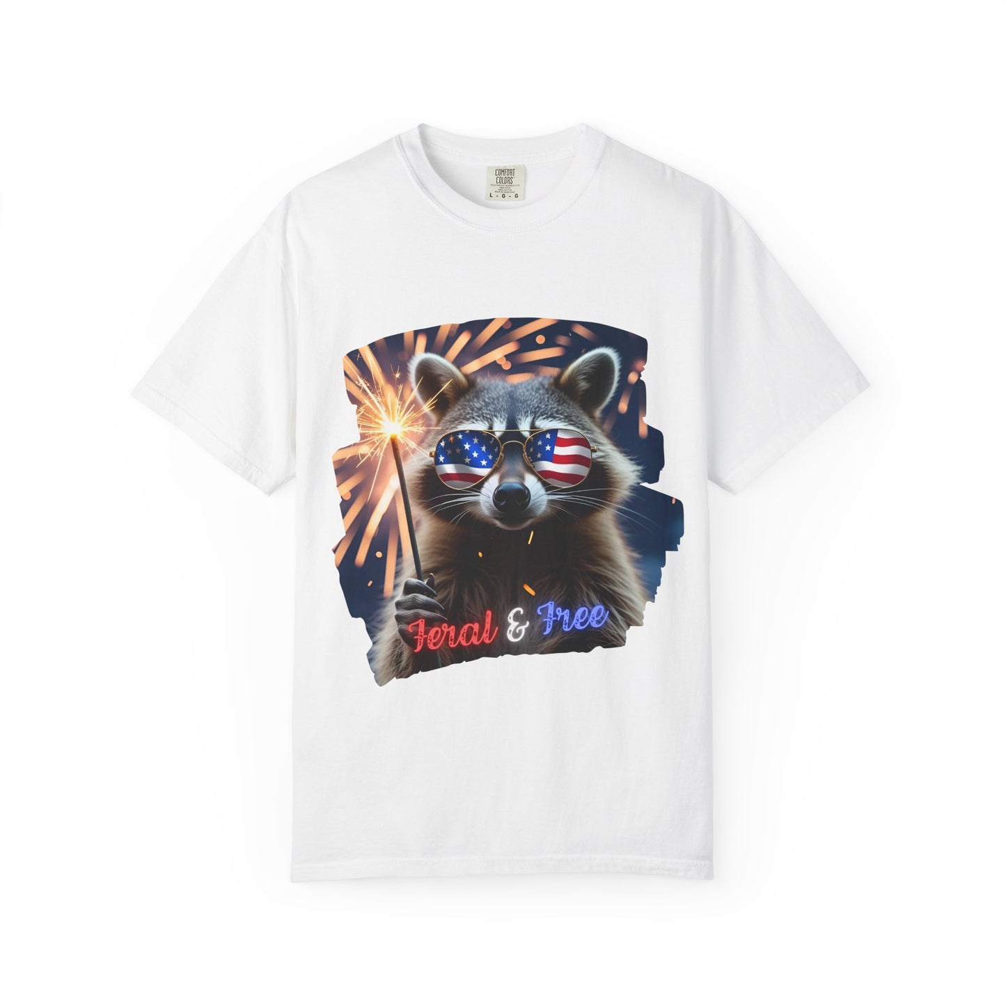 Stay wild in our “Feral & Free” tee! Featuring a raccoon rocking flag aviators, a sparkler in paw, and fireworks bursting behind—it’s pure chaotic patriotic energy for your summer vibe.
