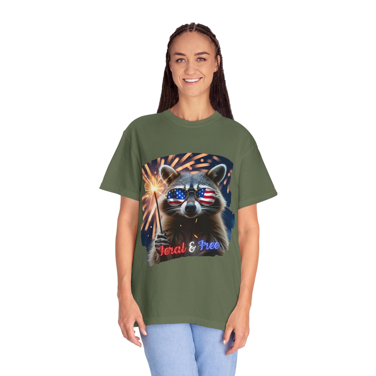 Stay wild in our “Feral & Free” tee! Featuring a raccoon rocking flag aviators, a sparkler in paw, and fireworks bursting behind—it’s pure chaotic patriotic energy for your summer vibe.