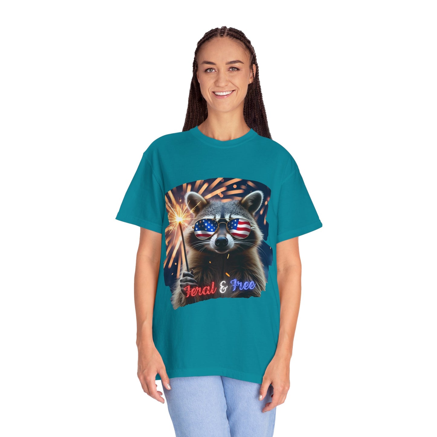 Stay wild in our “Feral & Free” tee! Featuring a raccoon rocking flag aviators, a sparkler in paw, and fireworks bursting behind—it’s pure chaotic patriotic energy for your summer vibe.