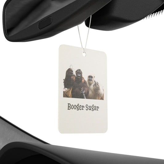 Smells fresh, looks wild. Bigfoot and Yeti caught mid-chat about that “booger sugar.” Add cryptid chaos and laughs to your ride—because even your car needs a little scandal.