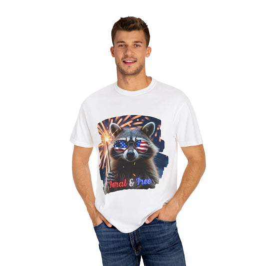 Stay wild in our “Feral & Free” tee! Featuring a raccoon rocking flag aviators, a sparkler in paw, and fireworks bursting behind—it’s pure chaotic patriotic energy for your summer vibe.