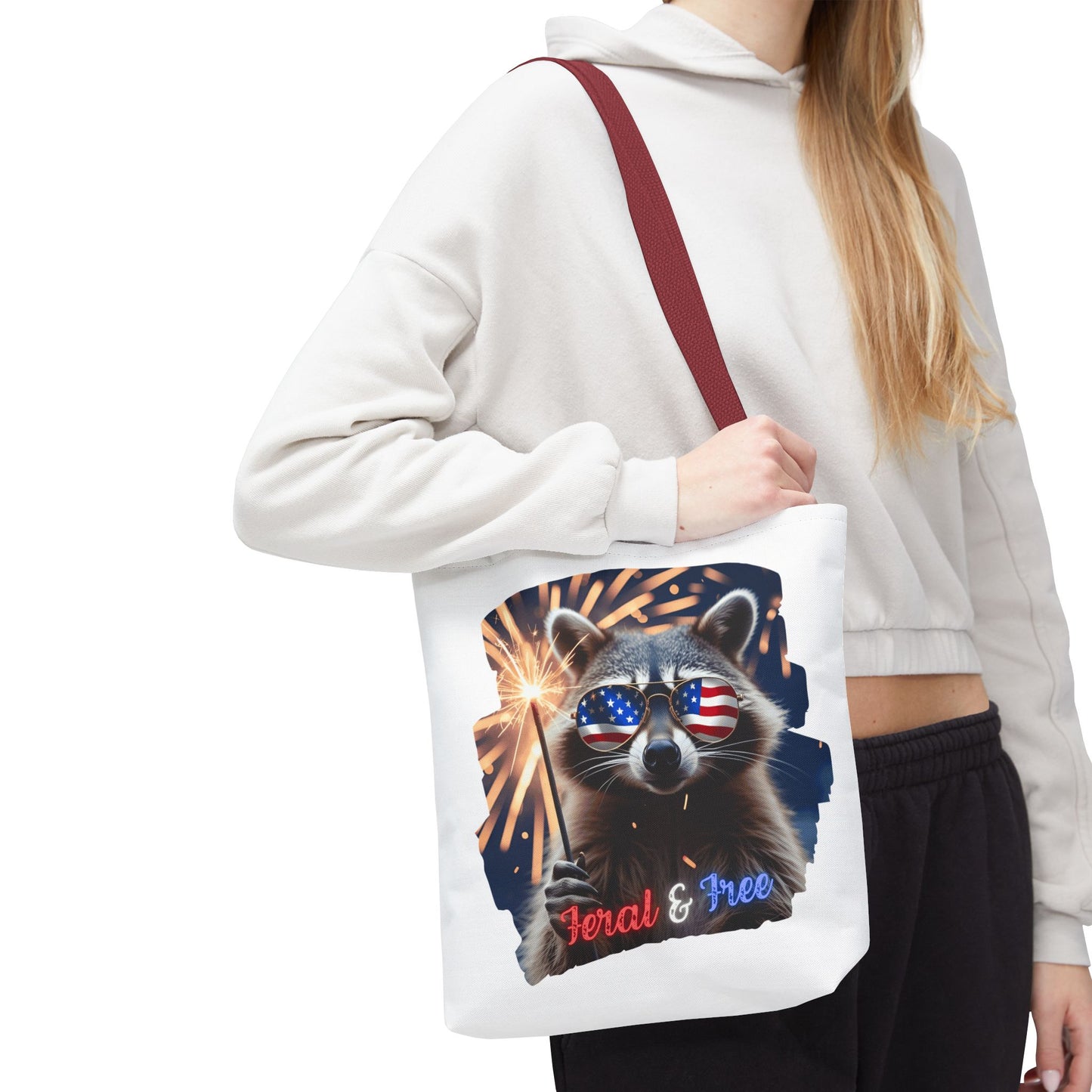 Chaos never looked so patriotic. This trash panda’s rocking flag shades, a sparkler, and zero chill. Feral. Free. Explosively American.